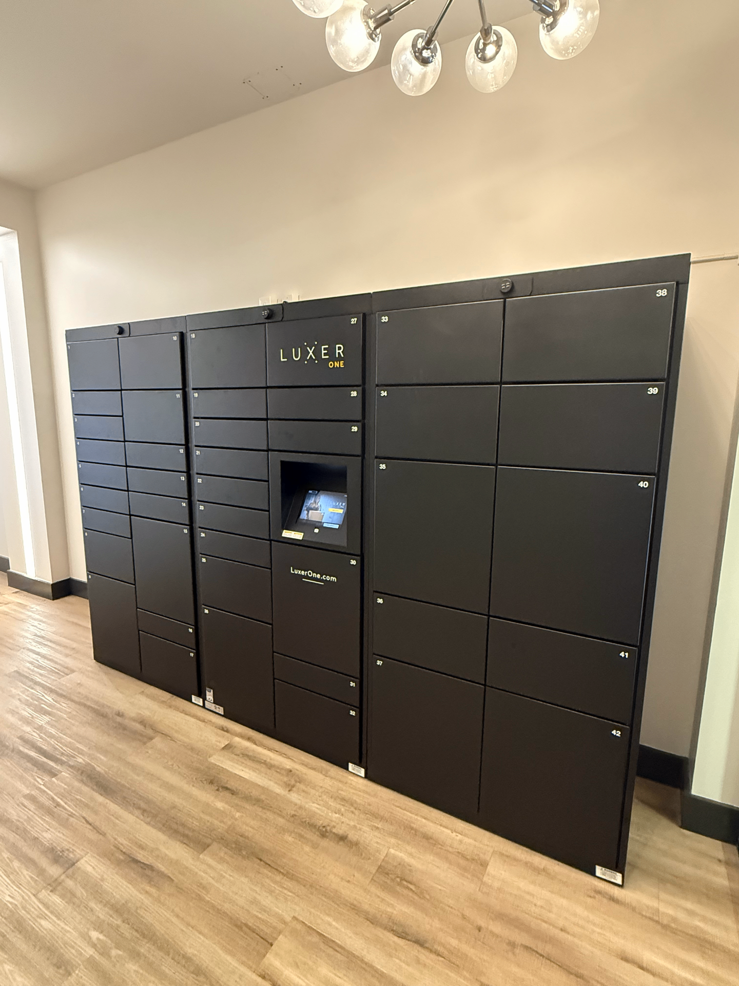 Luxer One® indoor package locker installation with mixed compartment sizes