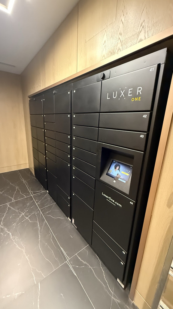 Luxer One® indoor package locker bank installed in a Class-A residential lobby