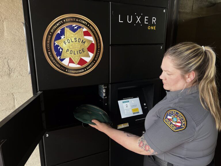 Folsom Police Department officer using Luxer One asset exchange smart locker